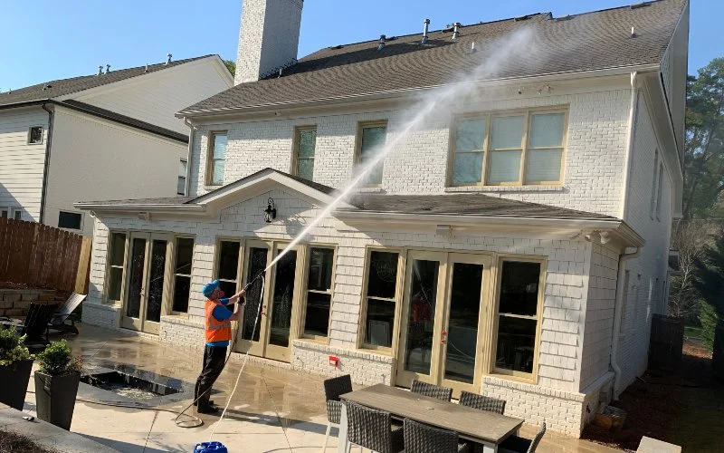 image of Pressure washing a house